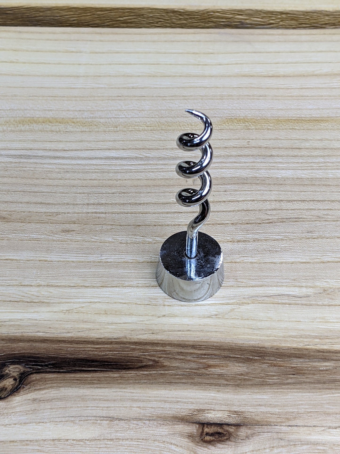 Corkscrew with attached base
